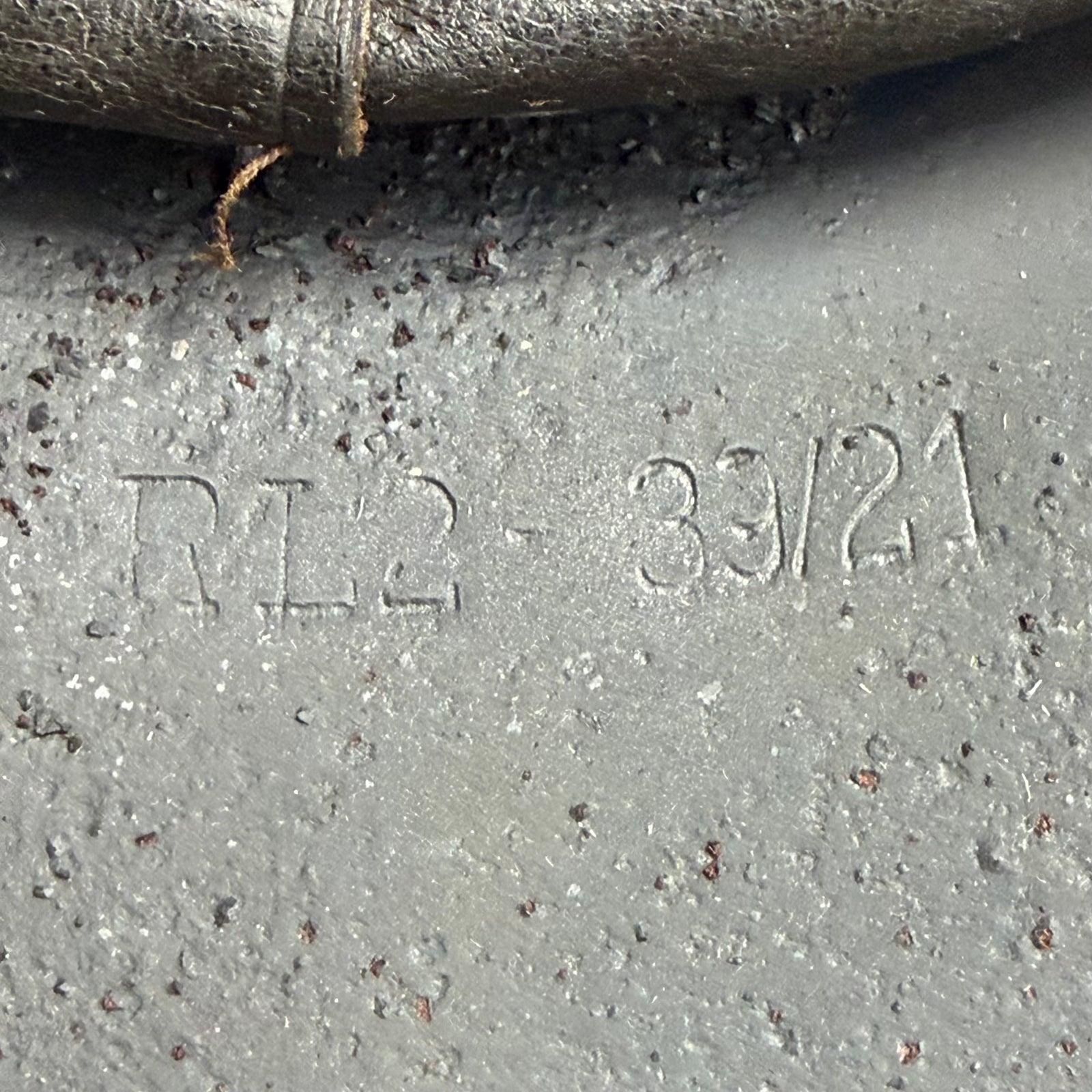 Close-up of RL-2 39/21 manufacturer and approval stamp inside helmet
