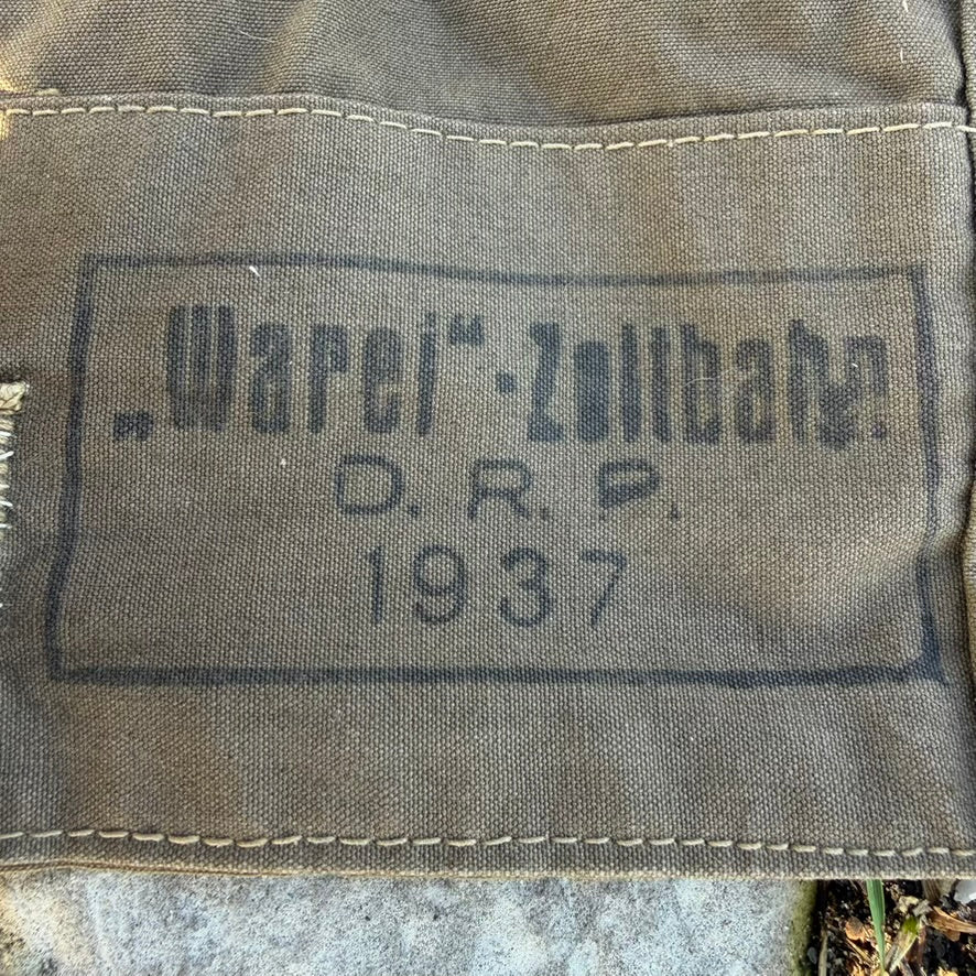 Faded original RAD ink stamp on German Zeltbahn, showing authentic service wear