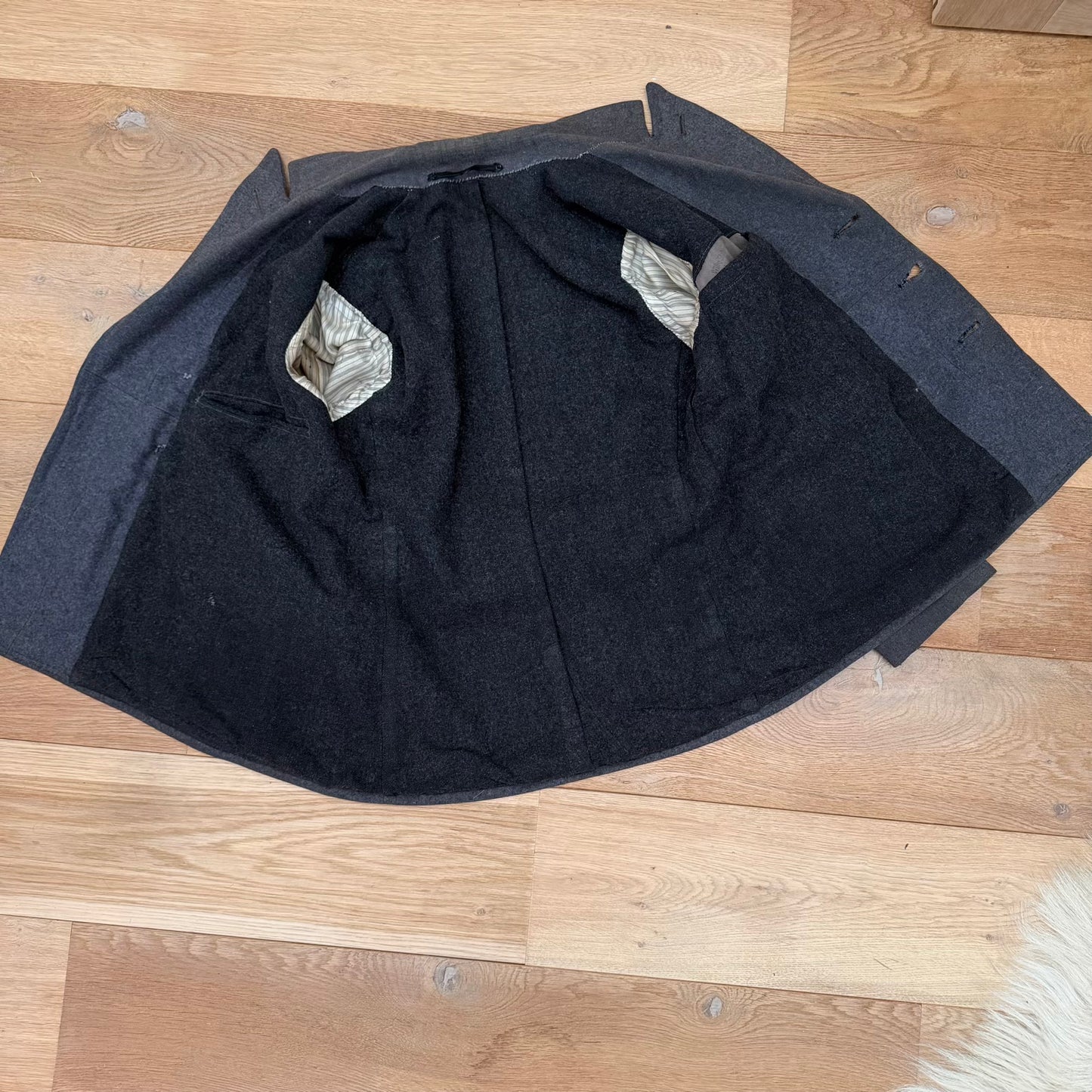Interior view of WWII German private tailored coat, showing heavy wool construction