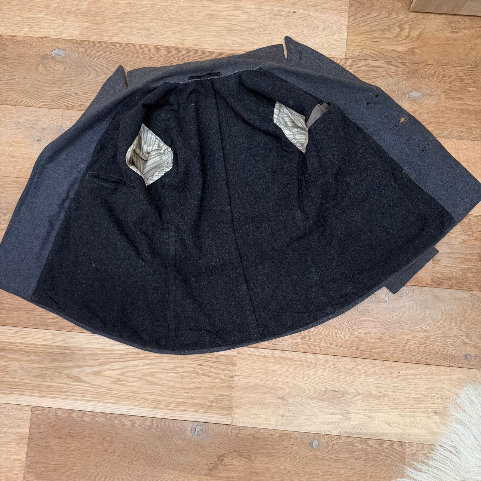 Interior view of WWII German private tailored coat, showing heavy wool construction