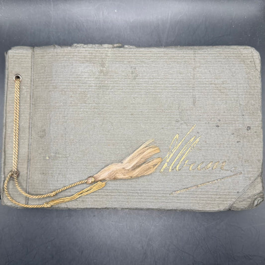 Original WWII German KLV photo album cover with handwritten name and tassel cord