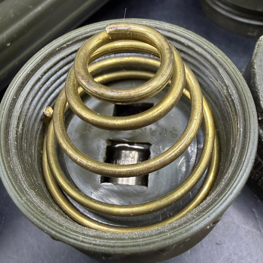 Close-up of bakelite body with wartime wear on U.S. Navy flashlight