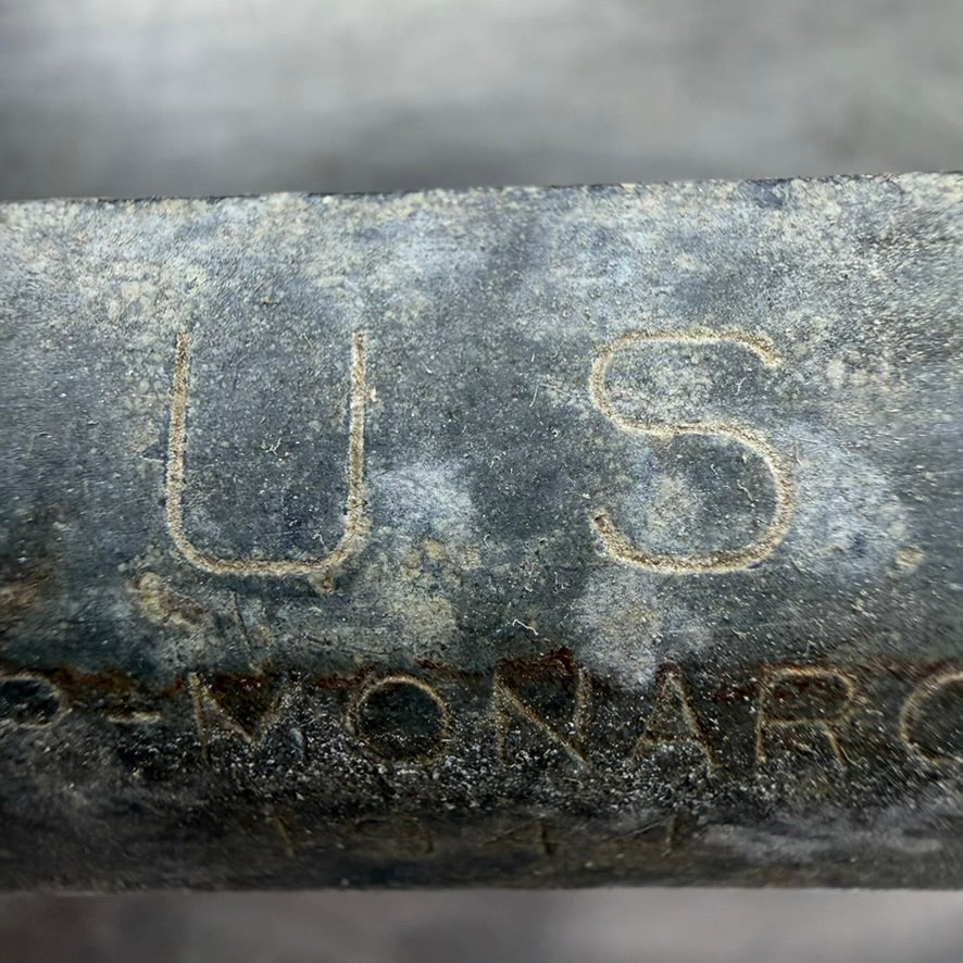 Close-up of U.S. marking on mess kit handle