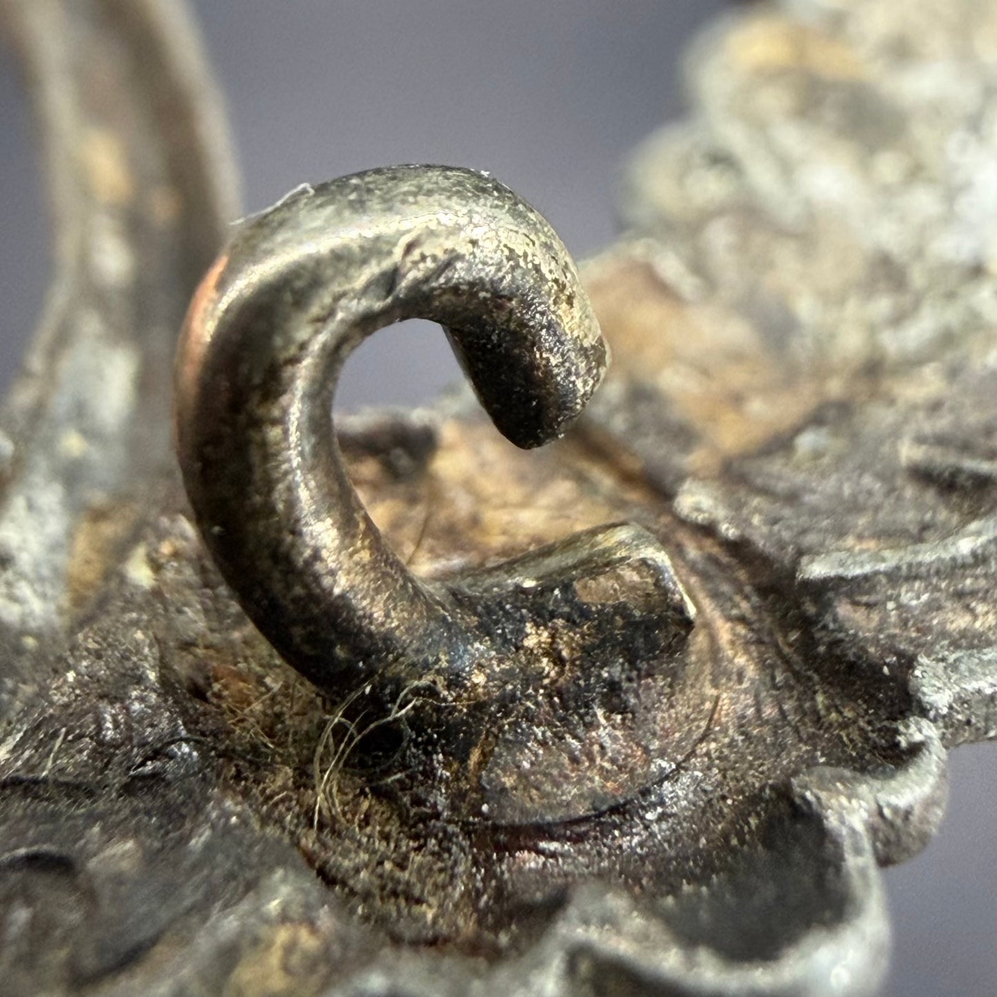 Side profile of original C-shaped catch on Infantry Assault Badge