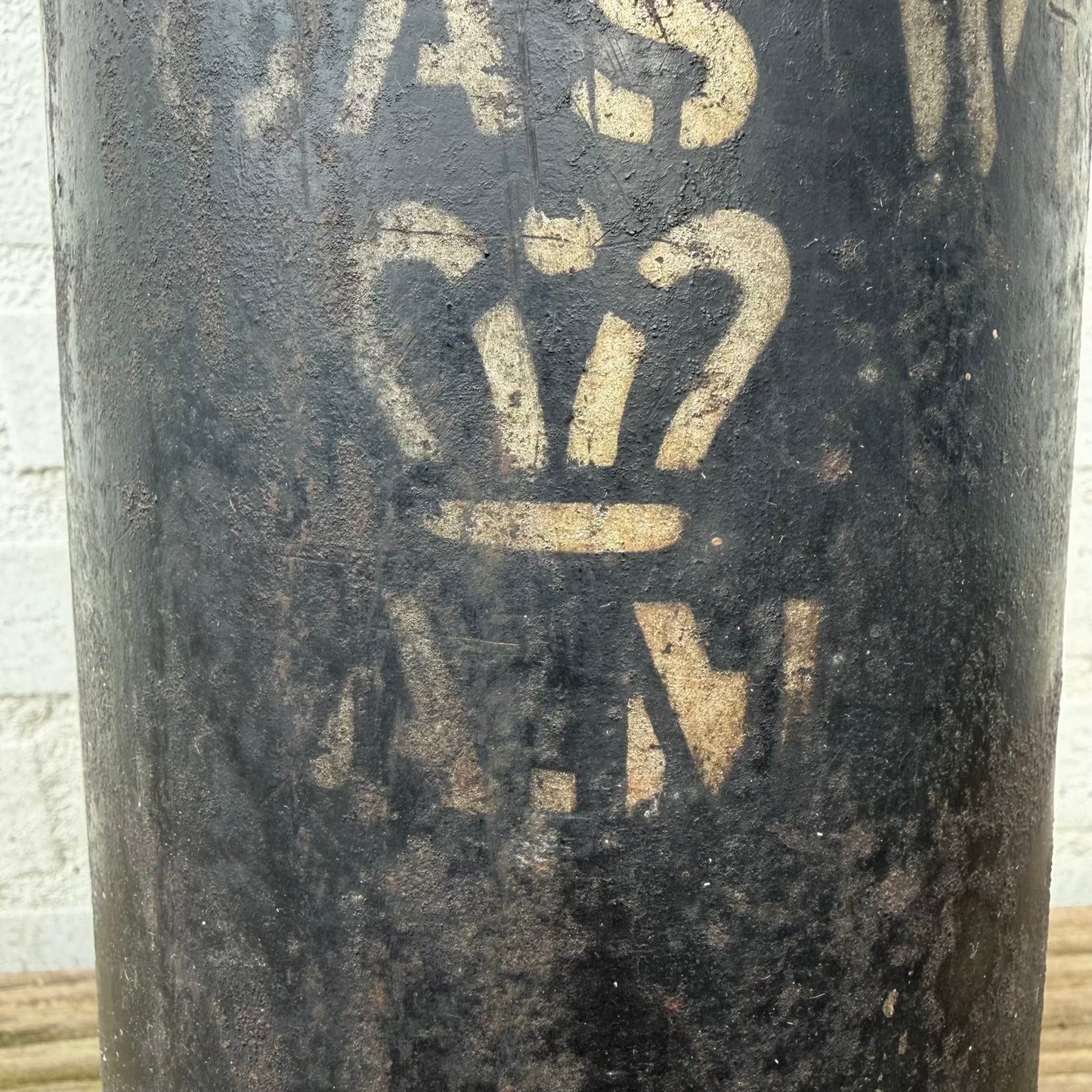 Close-up of large Air Ministry crown marking on RAF fire extinguisher cylinder