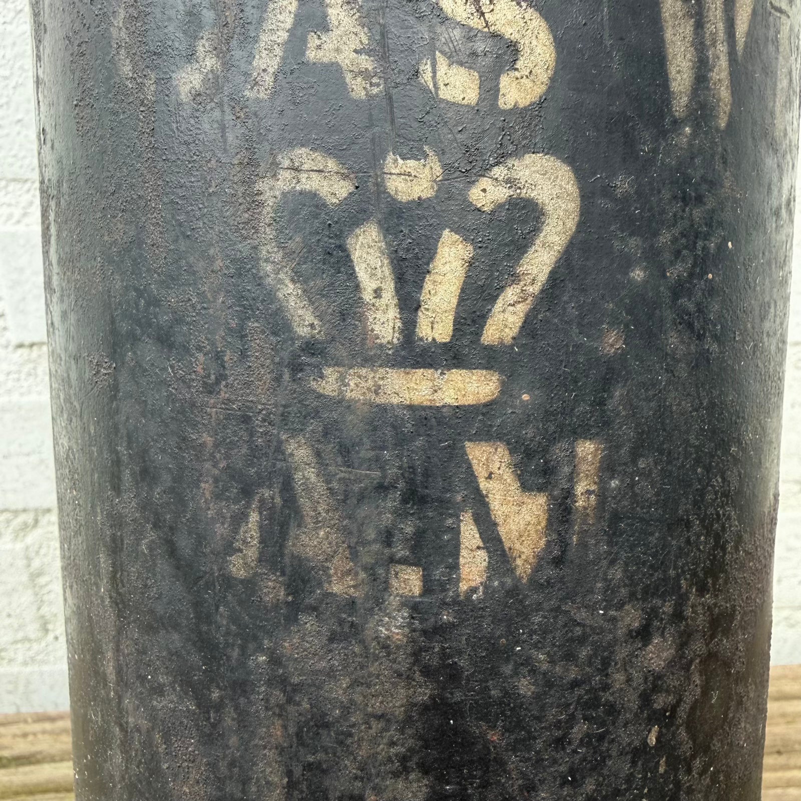 Close-up of large Air Ministry crown marking on RAF fire extinguisher cylinder