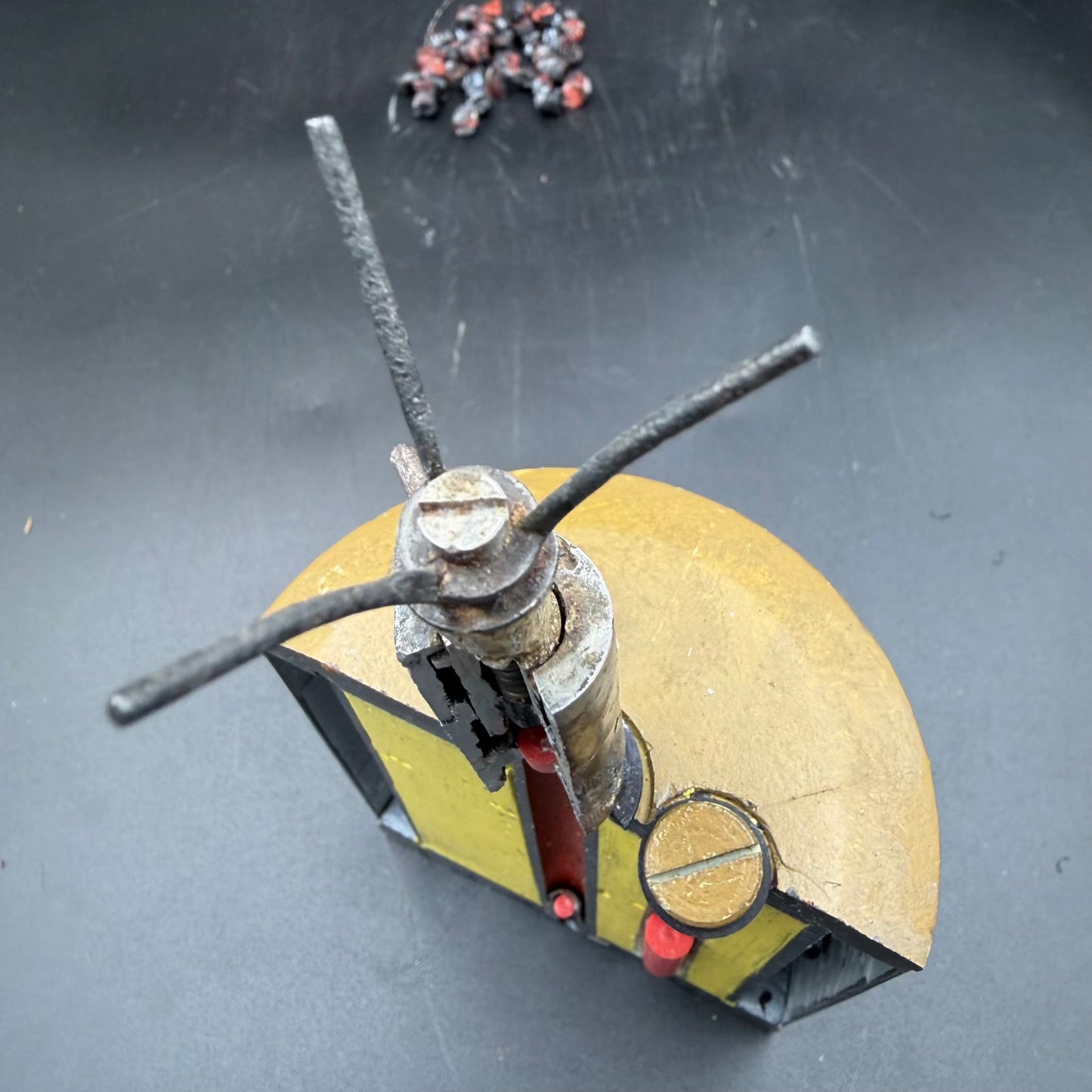 Top view of S-mine igniter assembly on sectioned WWII German mine