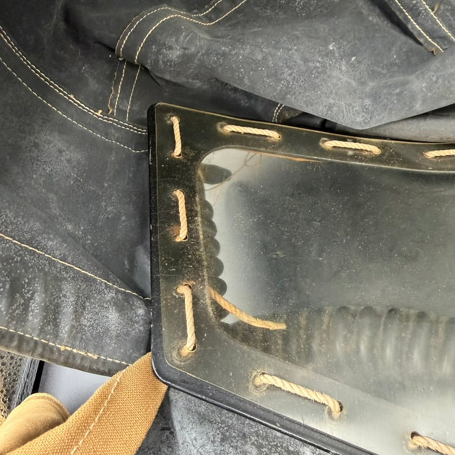 Close-up of transparent visor panel on WWII British Hospital Respirator gas mask