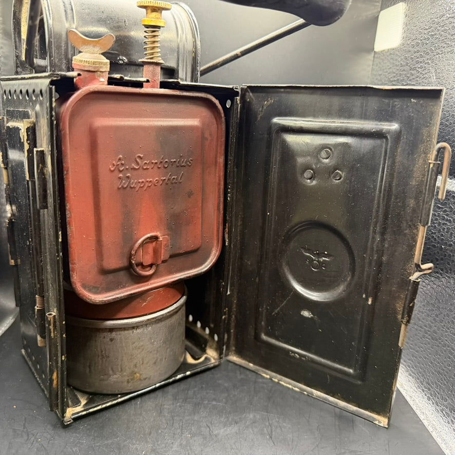 Open WWII Reichsbahn Einheitslaterne showing original red fuel container and door construction