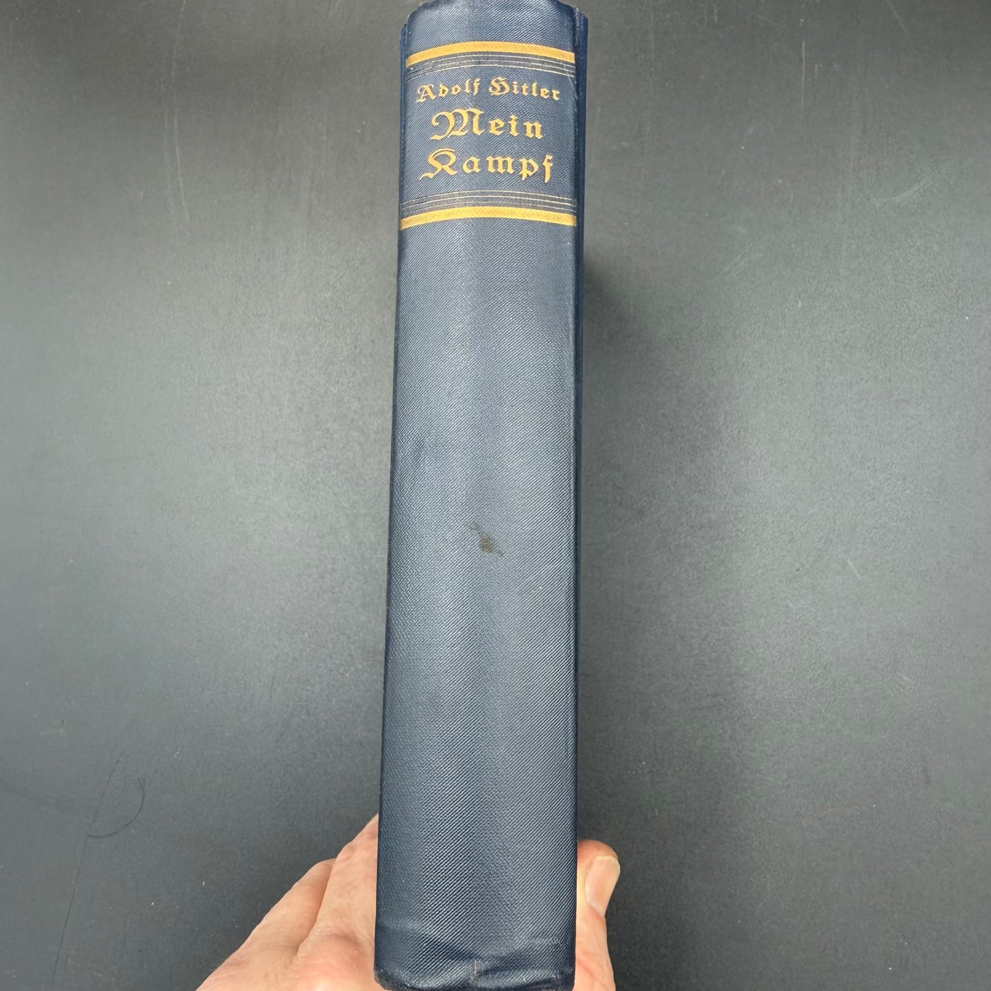 Spine of original 1935 Mein Kampf with gilt lettering in blue cloth binding