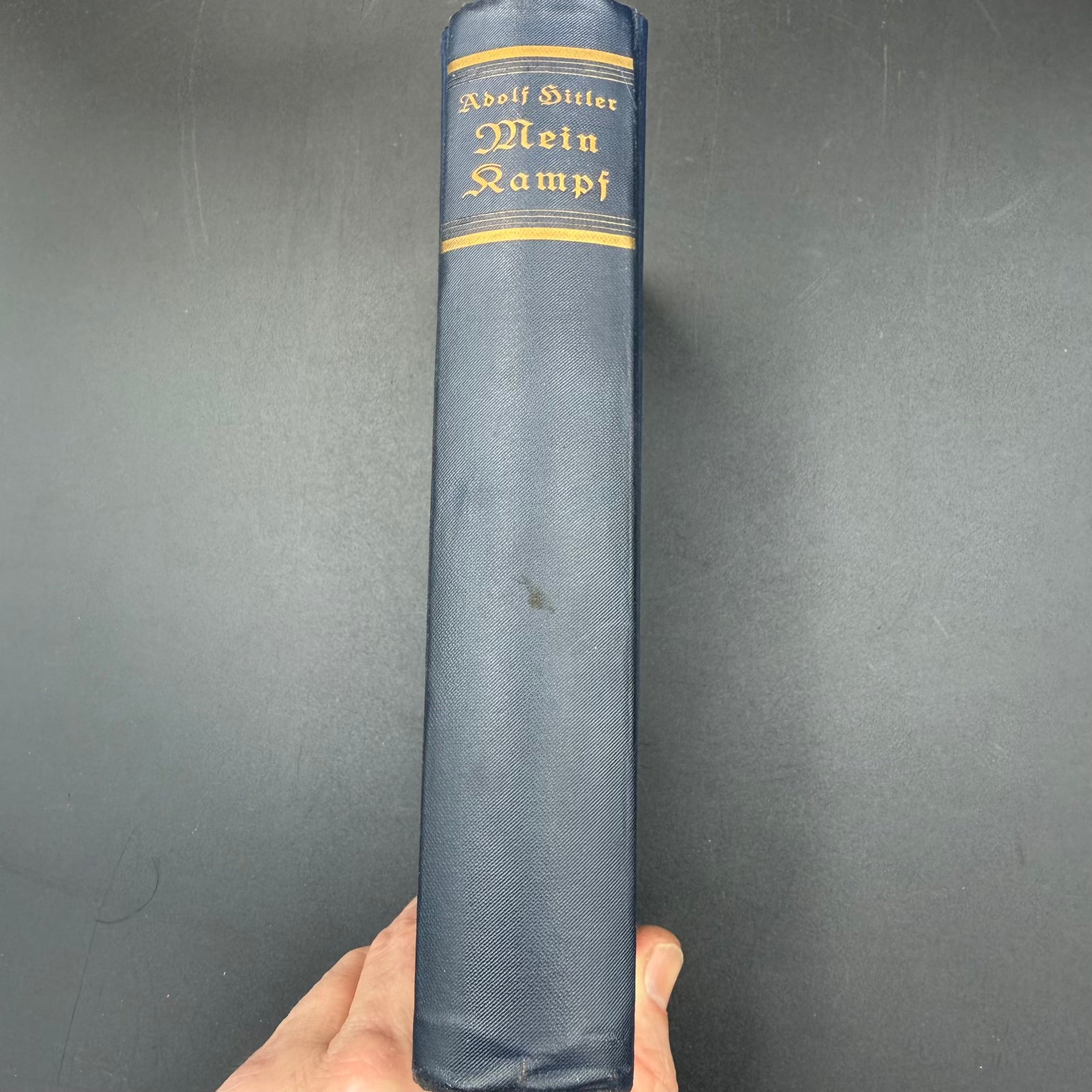 Spine of original 1935 Mein Kampf with gilt lettering in blue cloth binding