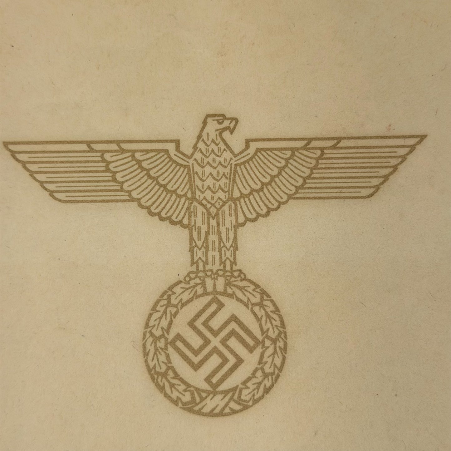 Detail of Wehrmacht eagle emblem on original WWII German death certificate