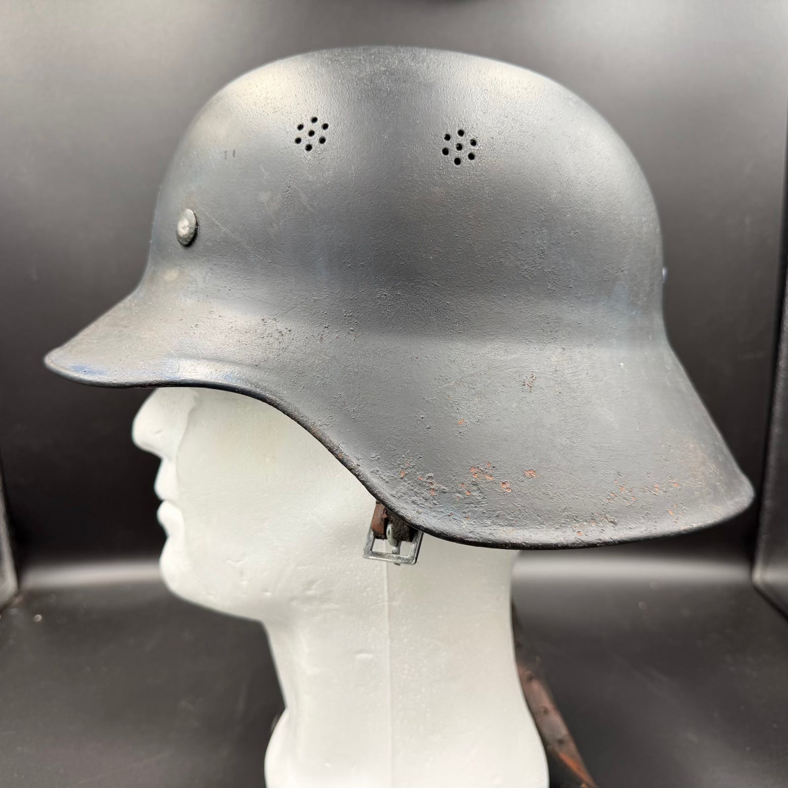 Left side profile of Luftschutz Gladiator helmet with intact shell shape