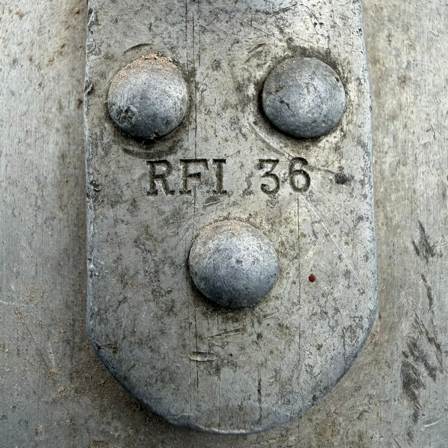 Close-up of RFI 36 maker stamp on handle mount of WW2 German jug