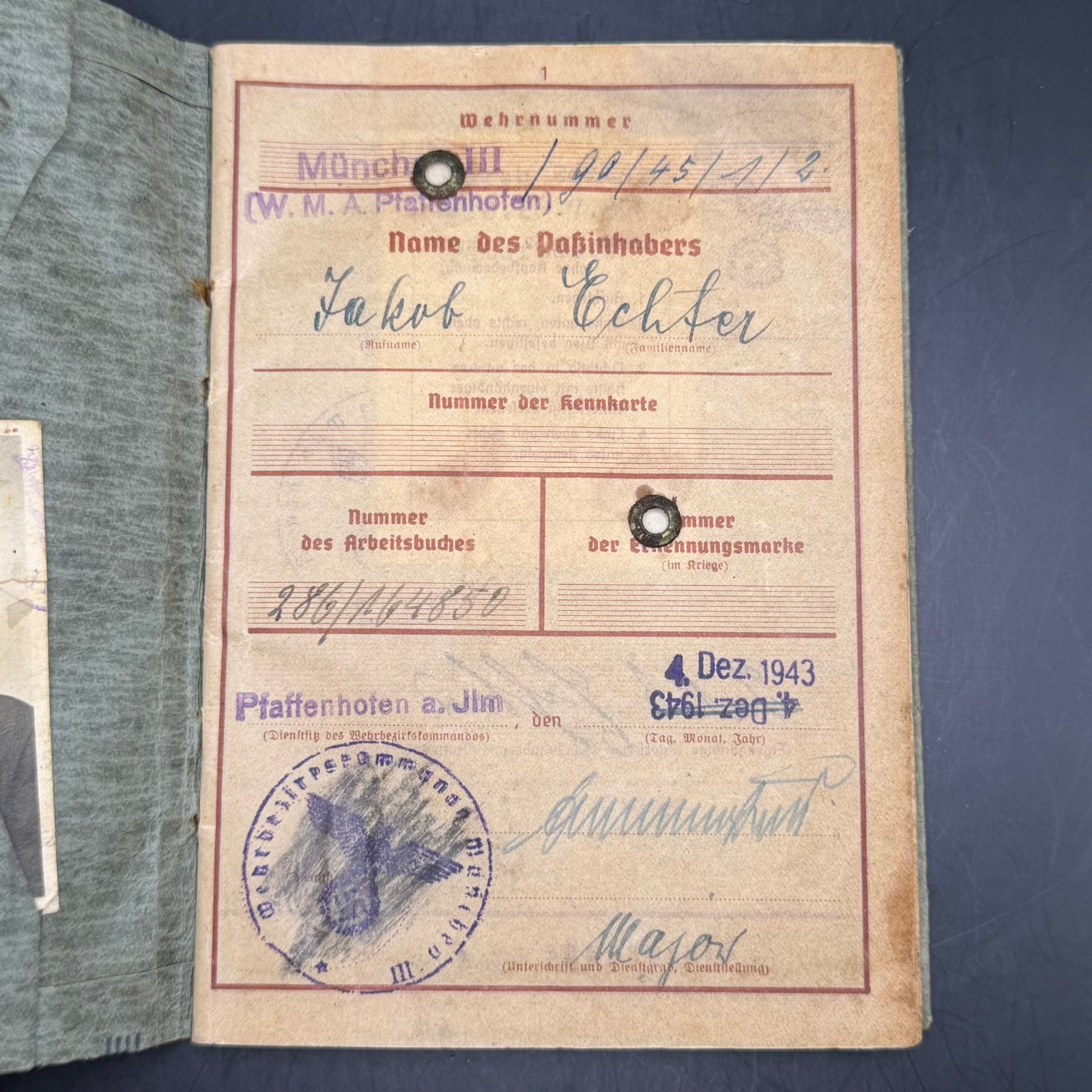 Wehrpass identification page with attached portrait photograph