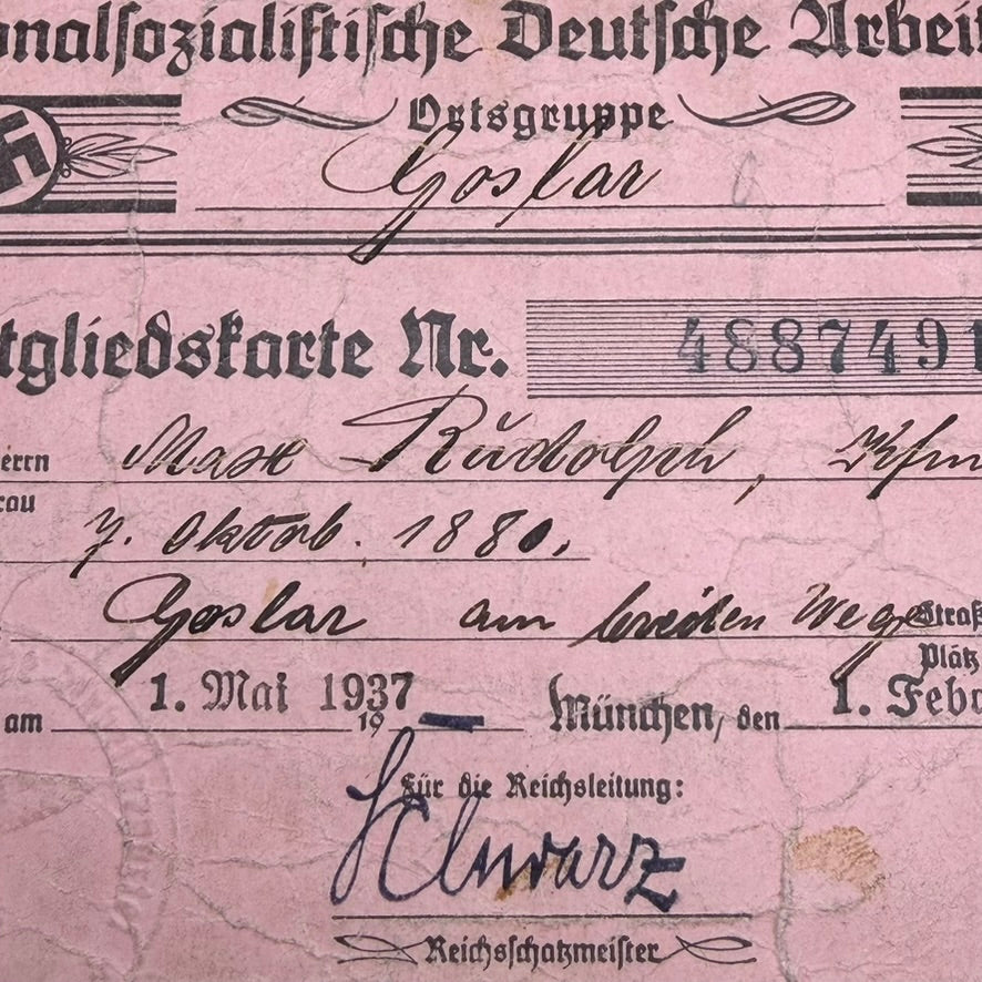 Handwritten personal details and official signature on WWII NSDAP membership card issued in Goslar