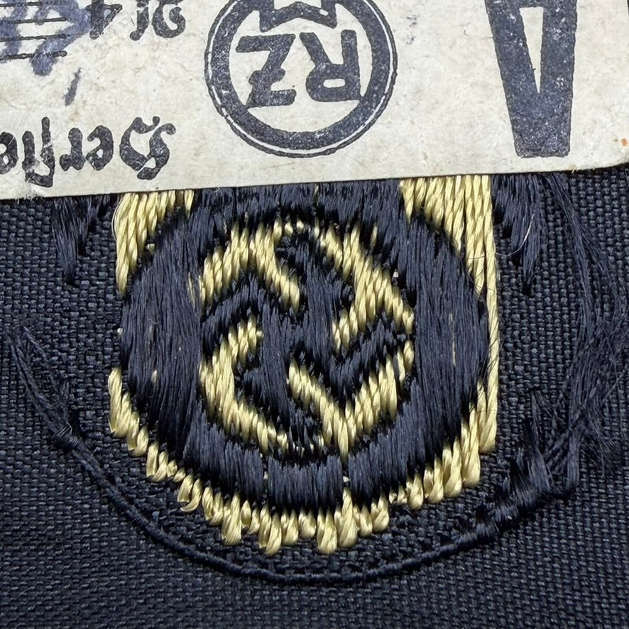 Woven wreath and swastika detail on SS tropical sleeve eagle backside