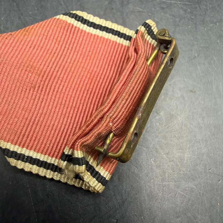 Close-up of suspension ring and eyelet on WWII Anschluss Medal