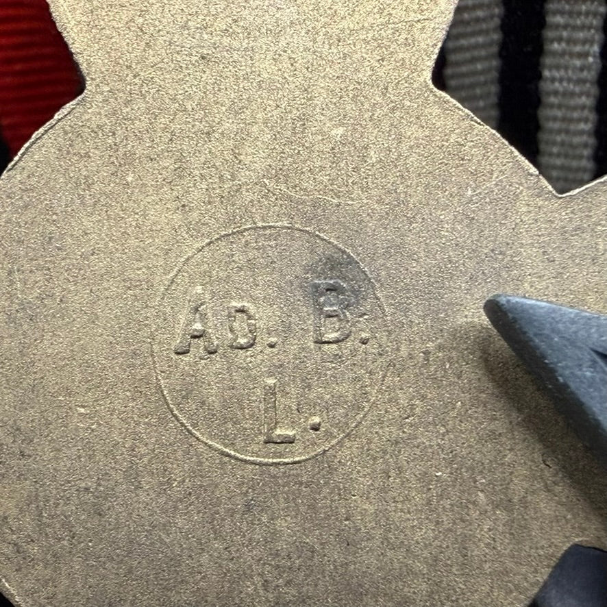 Close-up of maker mark “A.D.B. L.” on Honour Cross 1914–1918