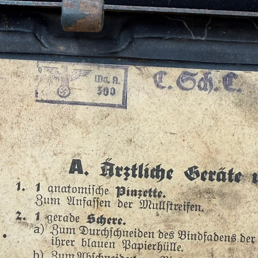 Close-up of swastika German medical instruction label inside first aid box