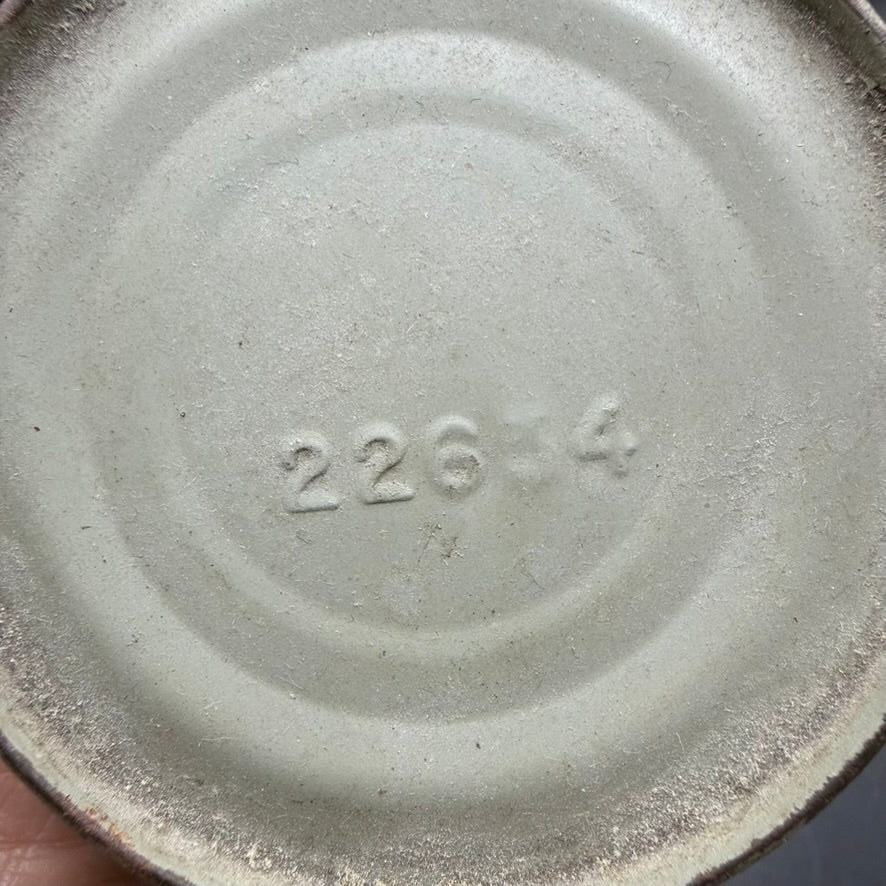 Bottom view showing 1944 date stamp on emergency water can