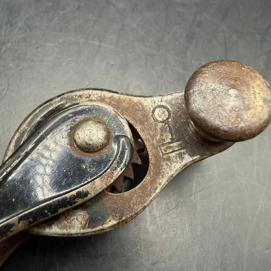 Detail of handle and cutting tip of German pre-war can opener