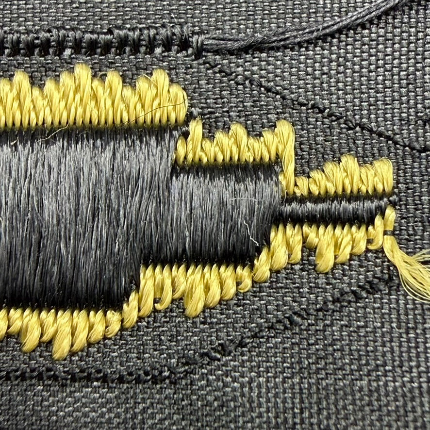 Close-up of wings on BeVo woven SS tropical eagle backside