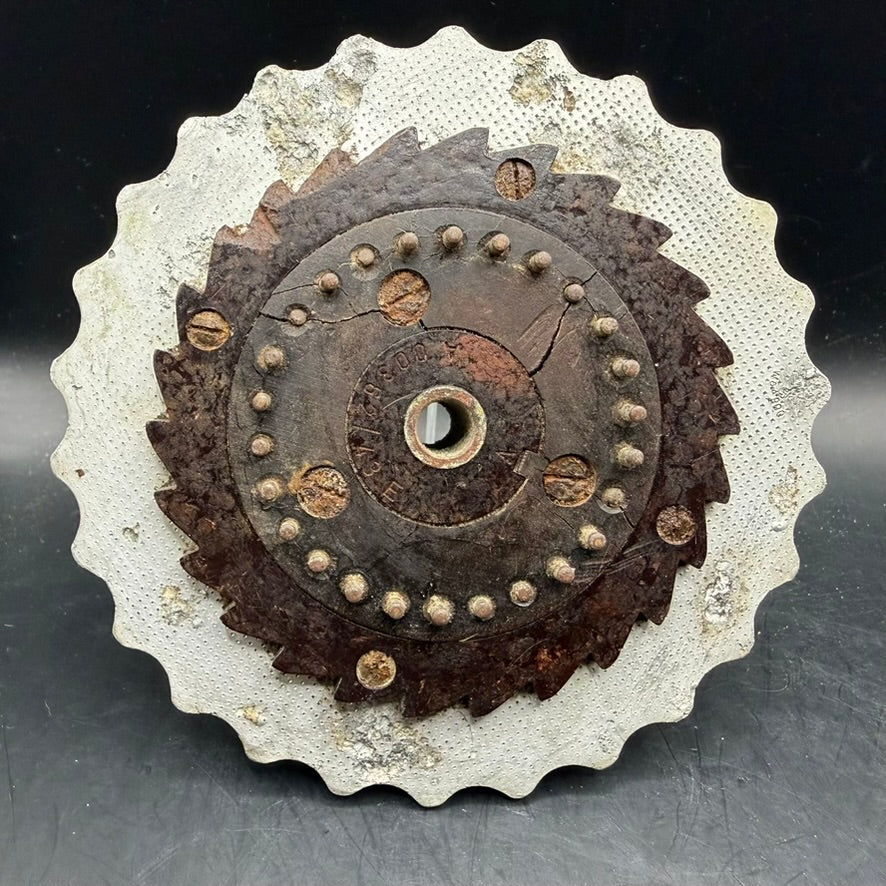 Rear view of WWII Enigma rotor with toothed ring and internal structure