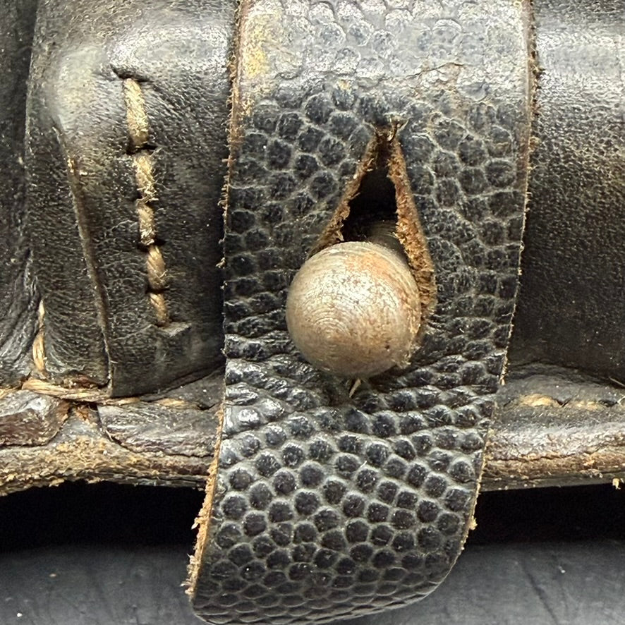 Detail of closure stud and strap on original WWII K98 ammunition pouch