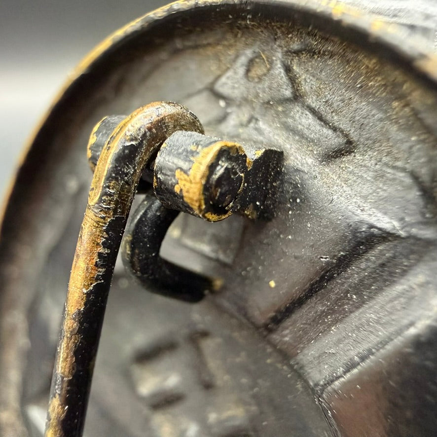 Close-up of block hinge on unmarked WWII German Wound Badge in Black