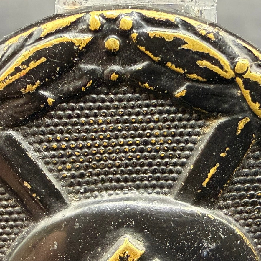 Close-up of wreath detail and blackened finish on WWII German Wound Badge in Black