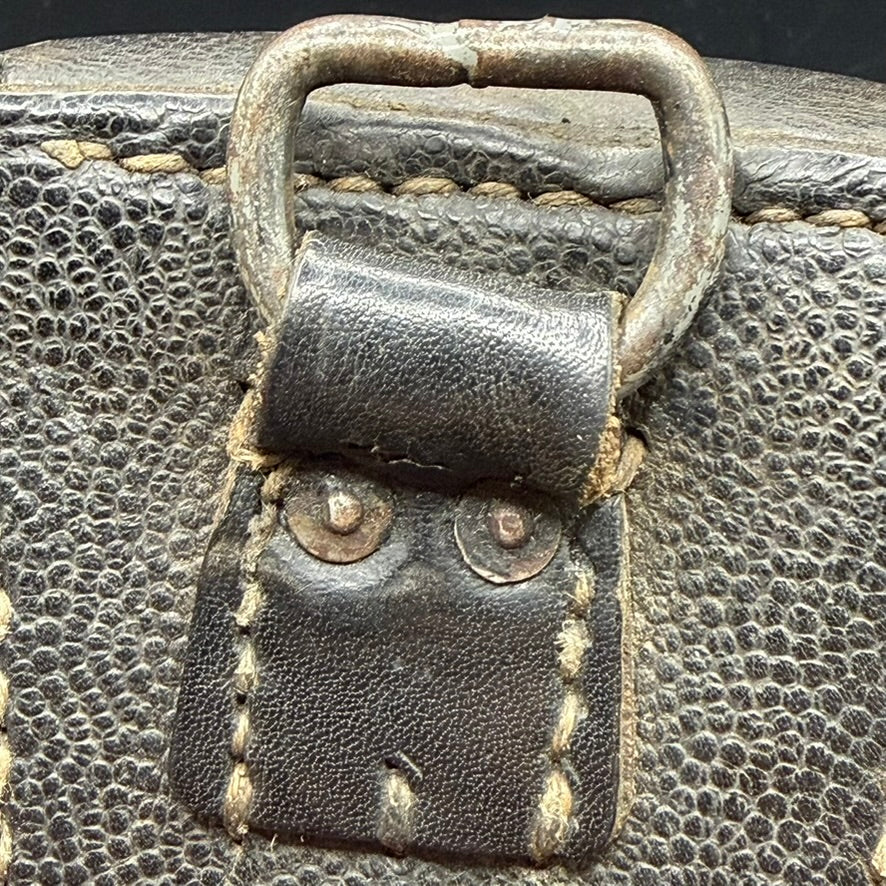 Detail of D-ring and leather tab on unmarked WWII German K98 pouch
