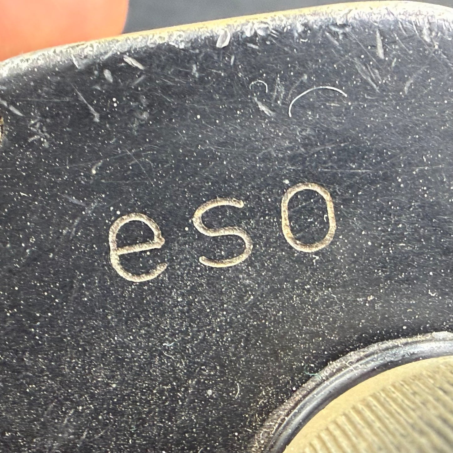 Detail view of eso manufacturer code on original WWII German Dienstglas 6×30 military binoculars.