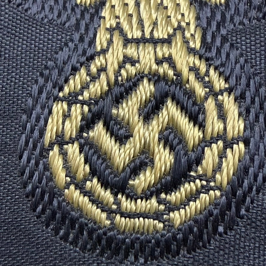 Woven wreath and swastika detail on SS tropical sleeve eagle front side