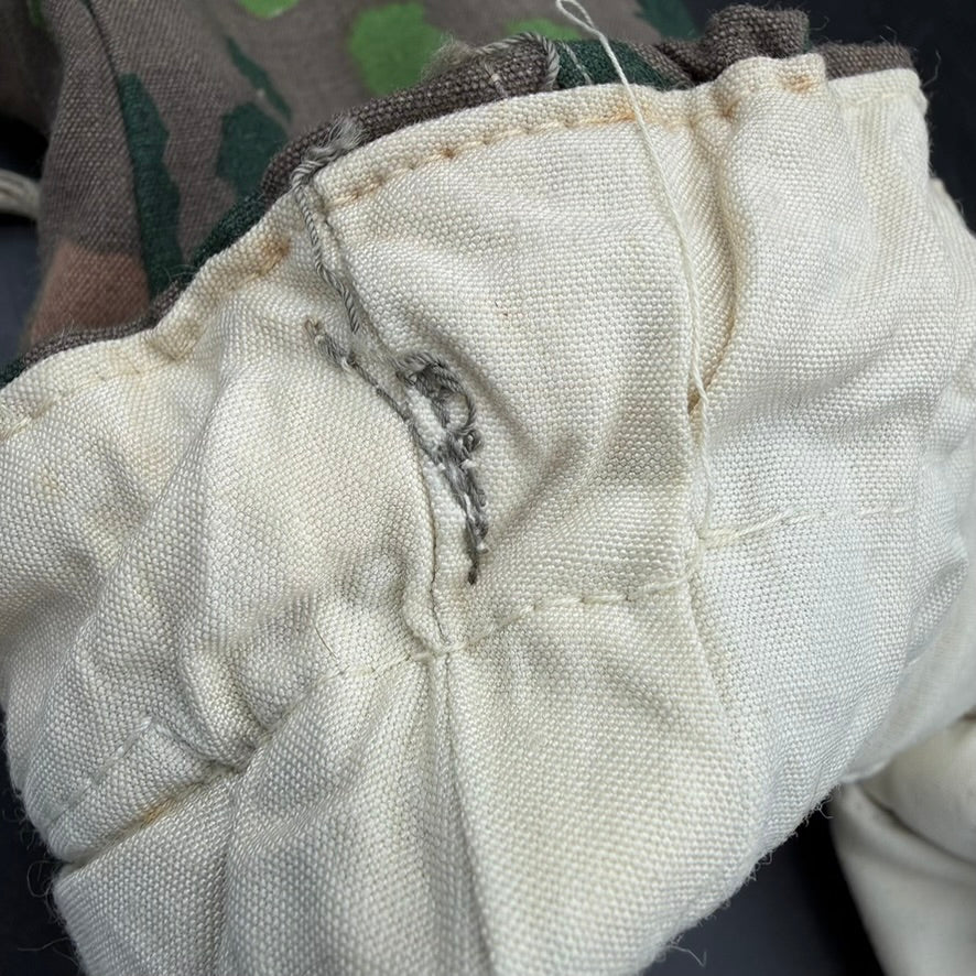 Close-up of inner padding and stitching consistent with wartime manufacture