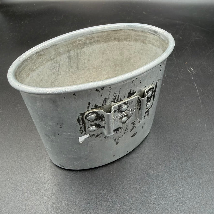 WW2 German aluminium M31 canteen cup with original attachment bracket, side view
