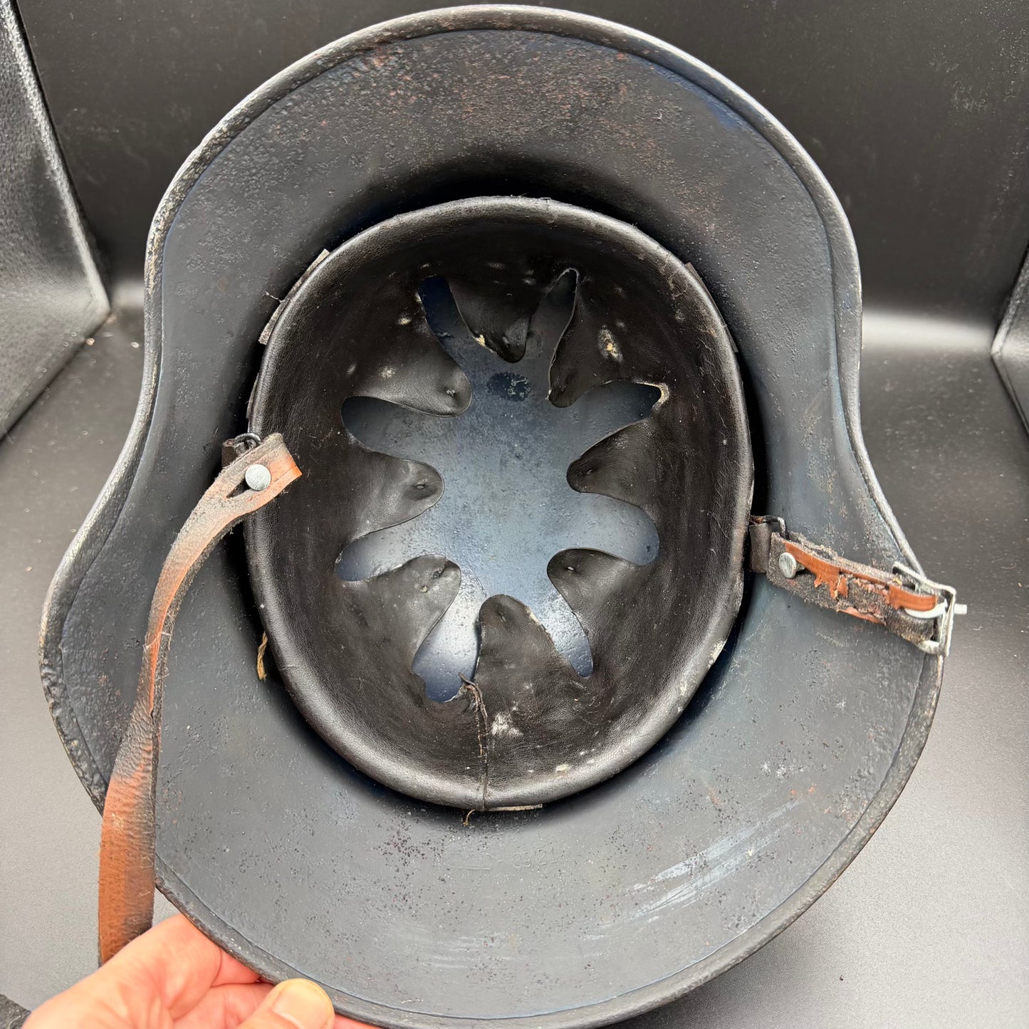 Interior view showing original leather liner inside Luftschutz helmet
