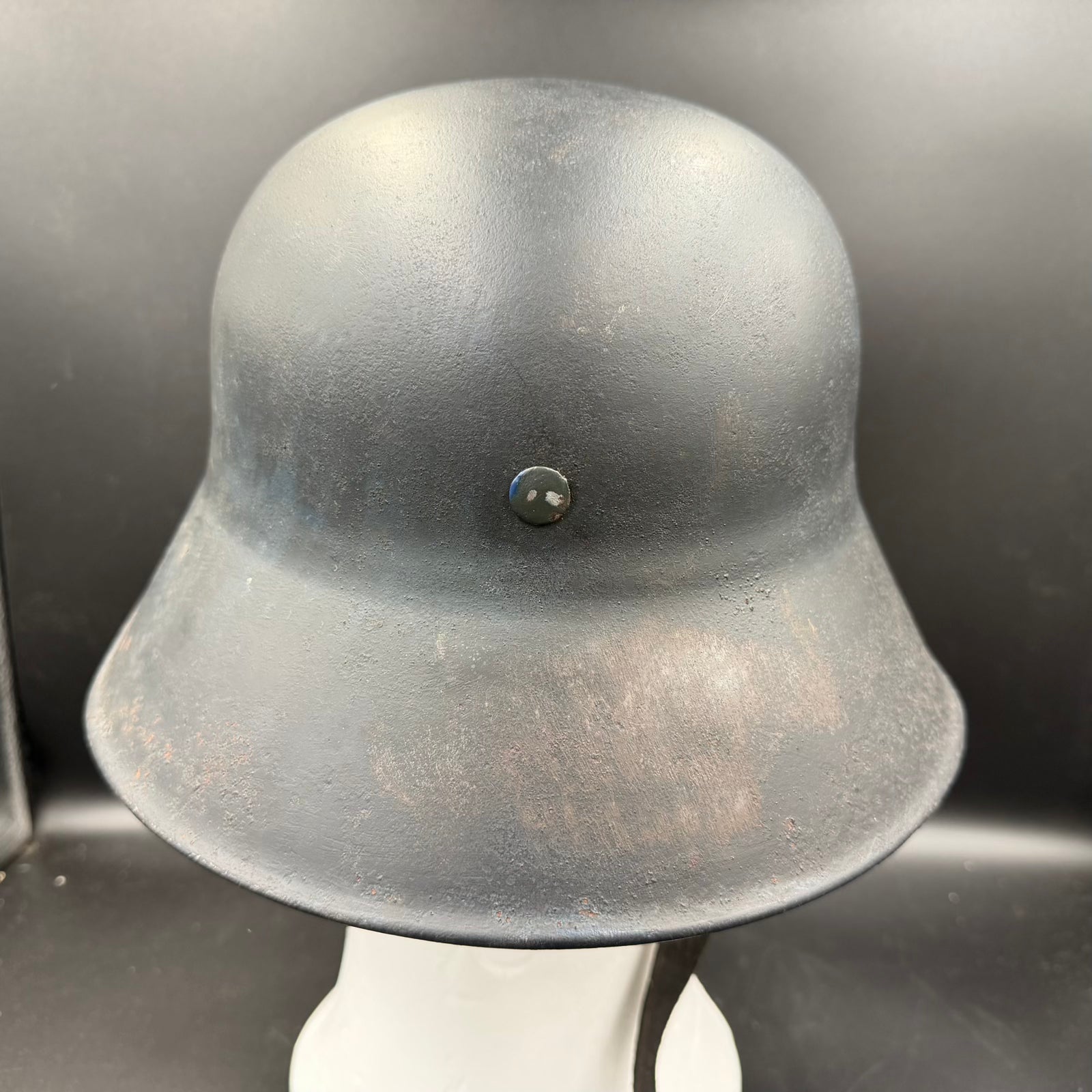 Rear view of WWII Luftschutz helmet with original paint and rivet