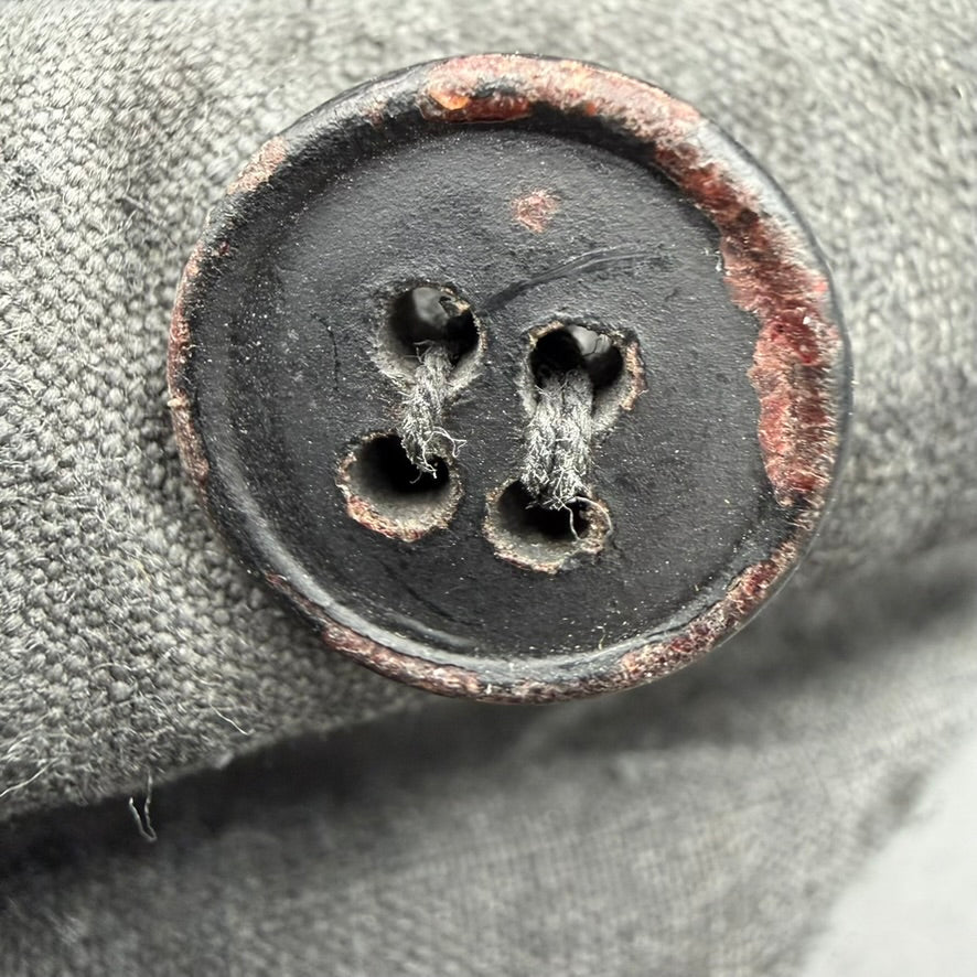 Original four-hole composite button on WWII Soviet TSh-3 tank helmet