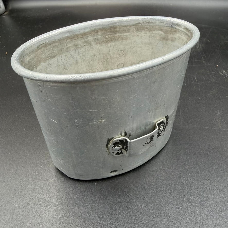 Rear view of WW2 German aluminium canteen cup showing mounting bracket and rivets
