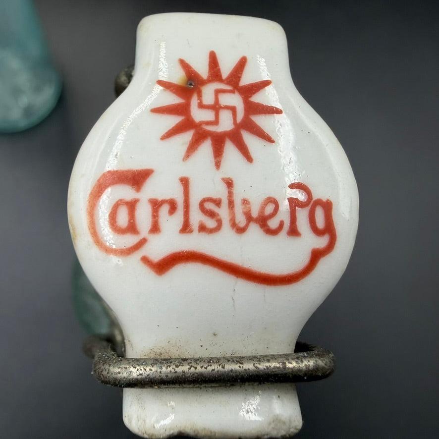 WW2 original artifact – Set of 2 Original Pre-WWII Carlsberg Bottles with Swastika Trademark – interior detail