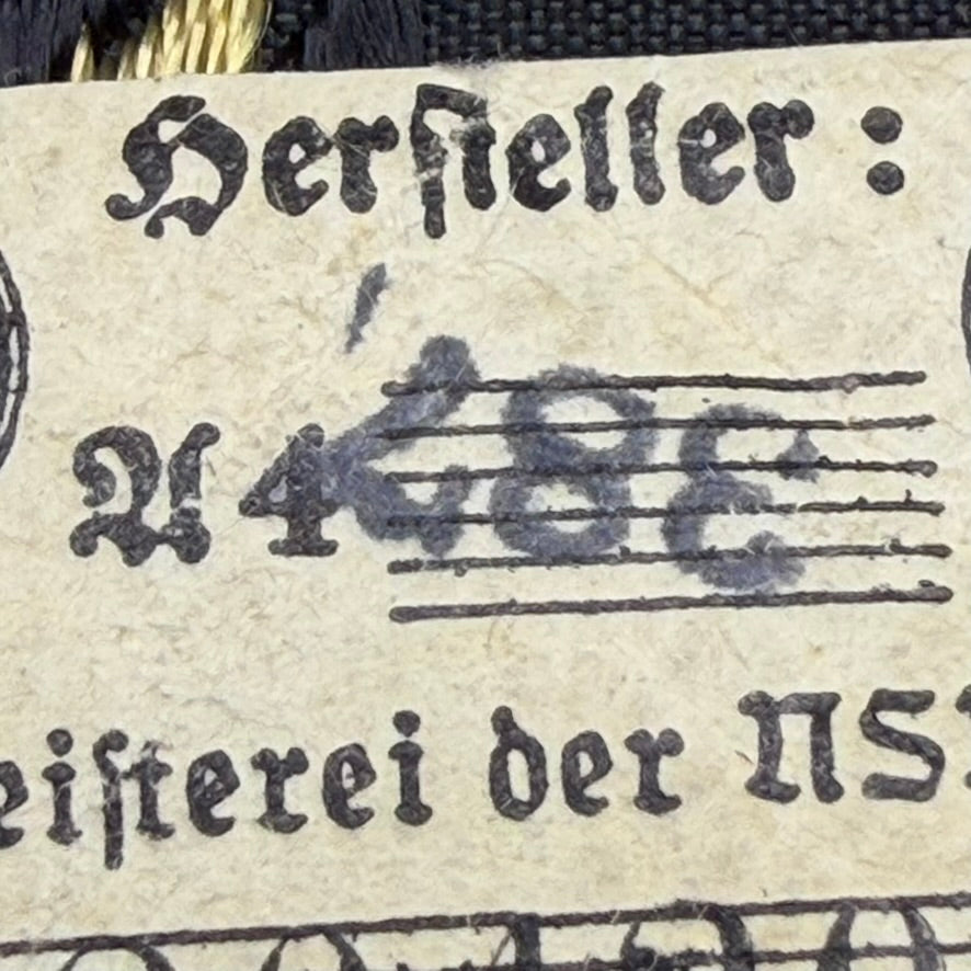 RZM code and serial number on SS tropical insignia tag