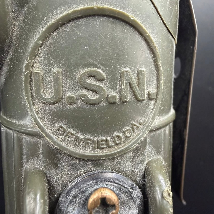 Side view of U.S.N. marked WWII angle head flashlight