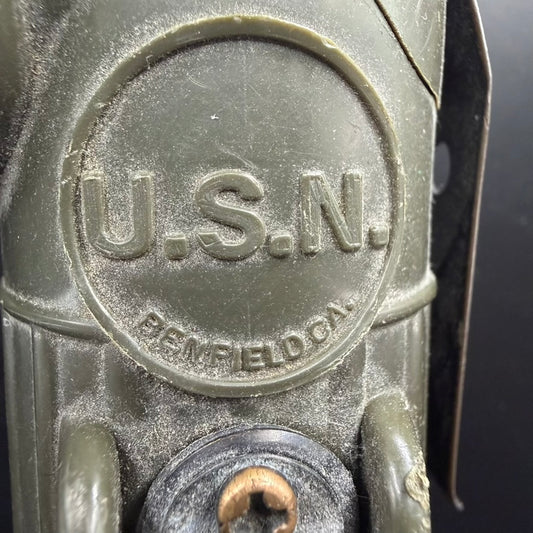 Side view of U.S.N. marked WWII angle head flashlight