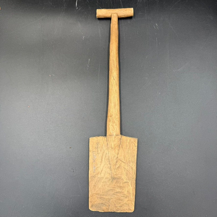 Reverse side of WWII German carved wooden spade