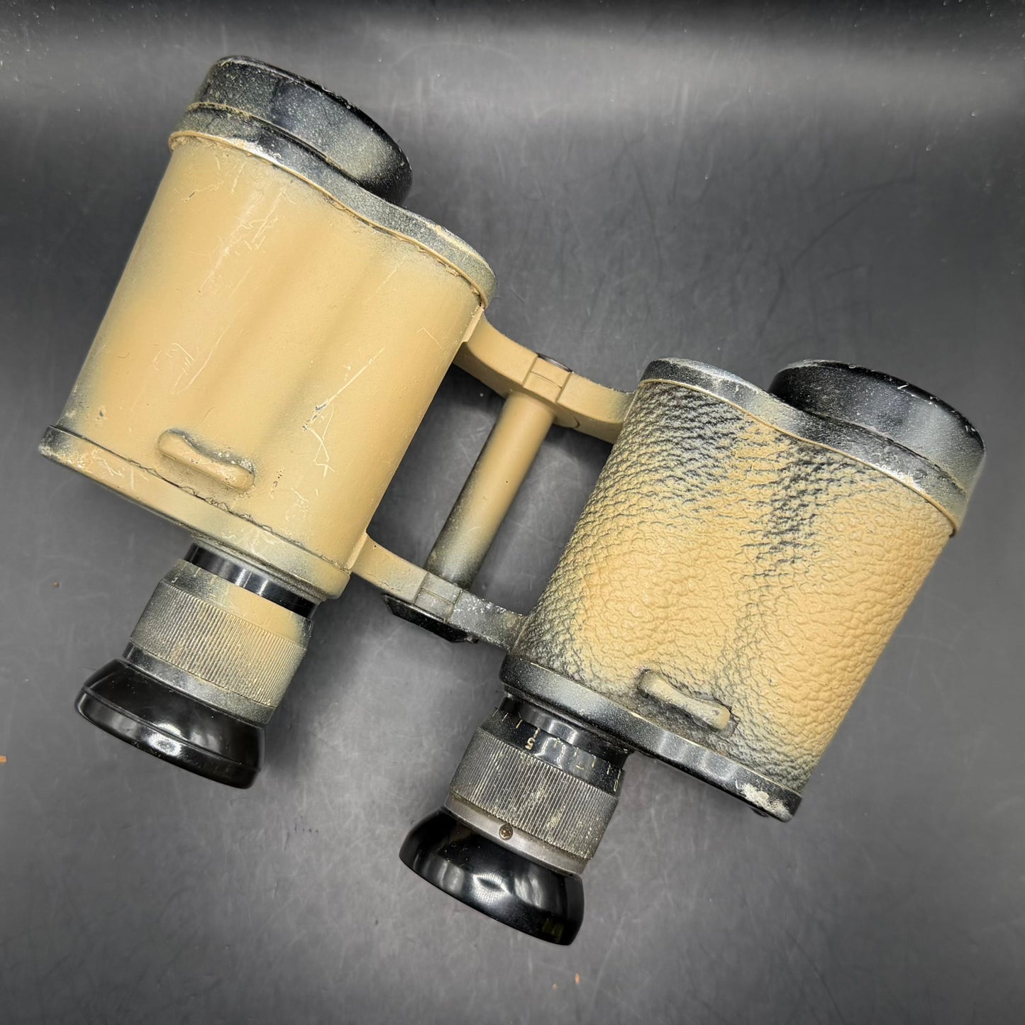 Side view of original WWII German Dienstglas 6×30 binoculars, displaying authentic wear and original wartime finish.