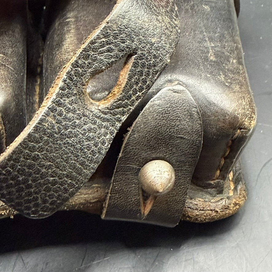 Close-up of original stitching and leather texture on K98 ammo pouch