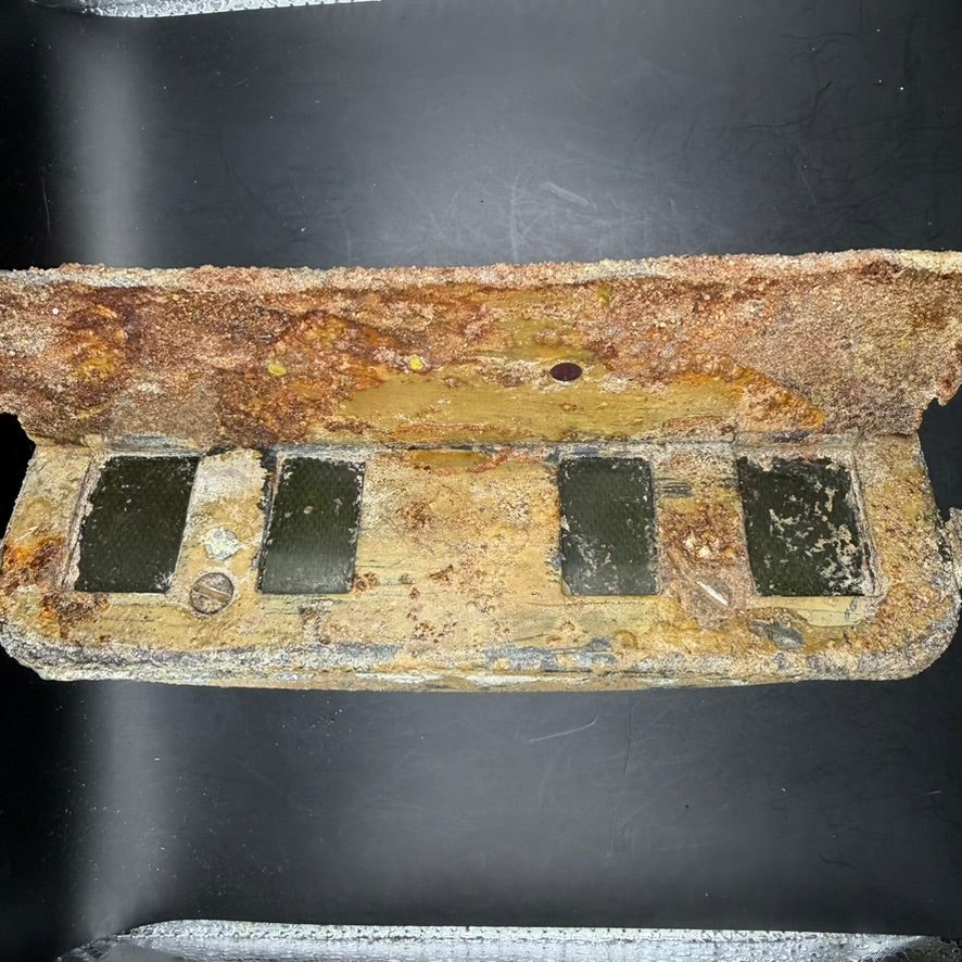 Top view of WWII Notek rear light housing with original paint remnants
