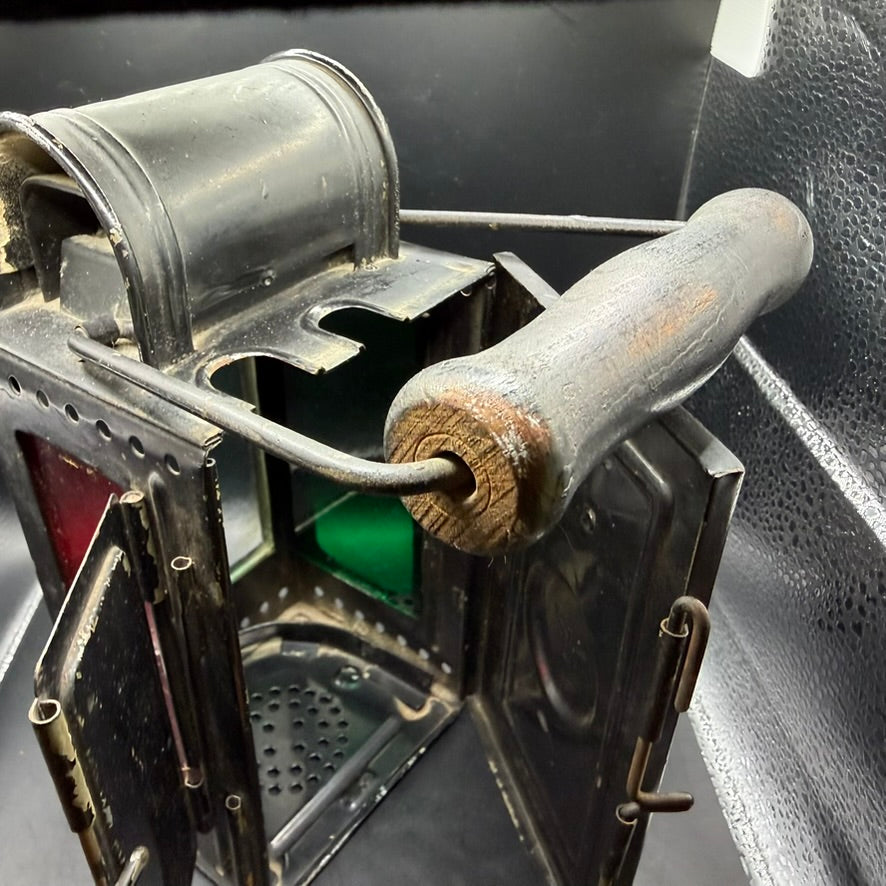 Side view of WWII Reichsbahn Einheitslaterne showing original handle and glass