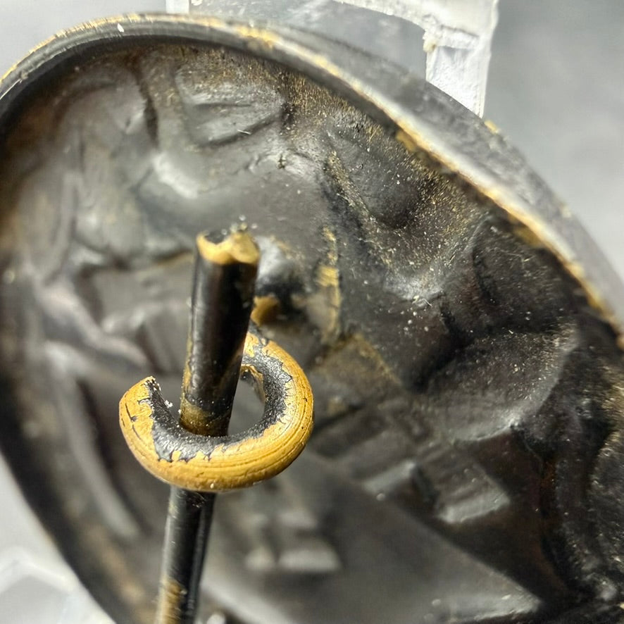 Detail of question mark catch on WWII German Wound Badge in Black, brass construction